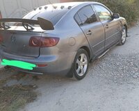 Mazda 323  2004 il 1 motor