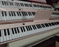 Çəhrayi rəngli Qatlanan piano