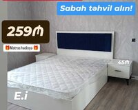 Taxt ikinəfərlik çarpayı