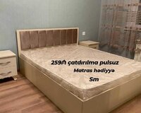 Taxt ikinəfərlik çarpayı