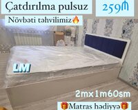 Taxt ikinəfərlik çarpayı