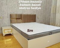 Taxt ikinəfərlik çarpayı