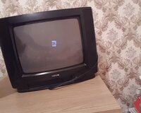 Nina televizor ustede krosnu aparati ile birlikde