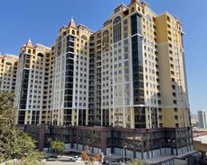 "Triumf Palace"-də 2 otaqlı Təmirli Mənzil Satılır