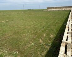 Aeraport yolunda 50 sot torpaq sahesi satilir