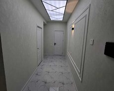 Qurtuluş 93 yaşayış kompleksində təmirli bina evi satılır