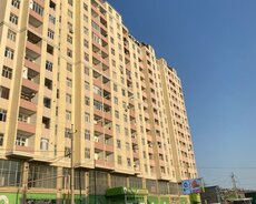 Masazırın girişində Aplus marketin binası podmayak mənzil
