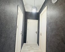 Qarayevde temirli stalinka 2 balkon,metro 5 deq