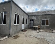 mastagada tam merkezde 3 otaqli ev satilir