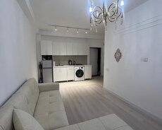 Masazırda təmirli, əşyalı bina evi satılır