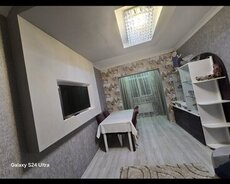 Yeni Günəşli 290 nömrəli məktəbin düz yanındakı binada