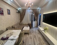 Masazırın girişində əşyalı kupçalı mənzil satılır
