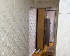 1 otaqlı orta təmirli mənzil satılır