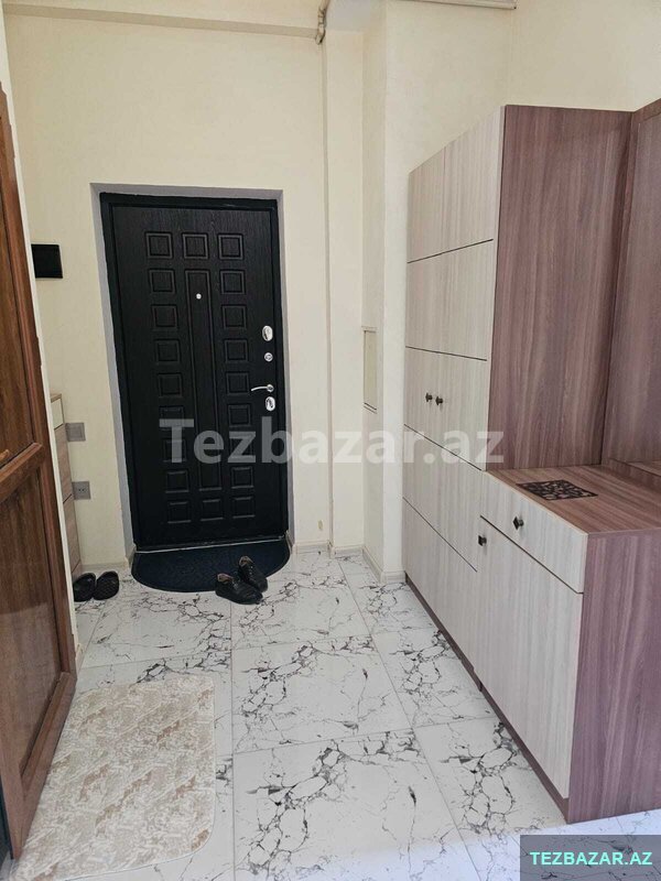 Yeni Bakı Yaşayış kompleksində təmirli bina evi satılır Yeni Bakı Yaşayış kompleksində təmirli bina evi satılır