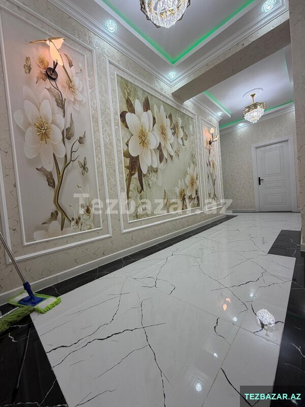 Xəzri yaşayış kompleksində təmirli bina evi satılır Xəzri yaşayış kompleksində təmirli bina evi satılır