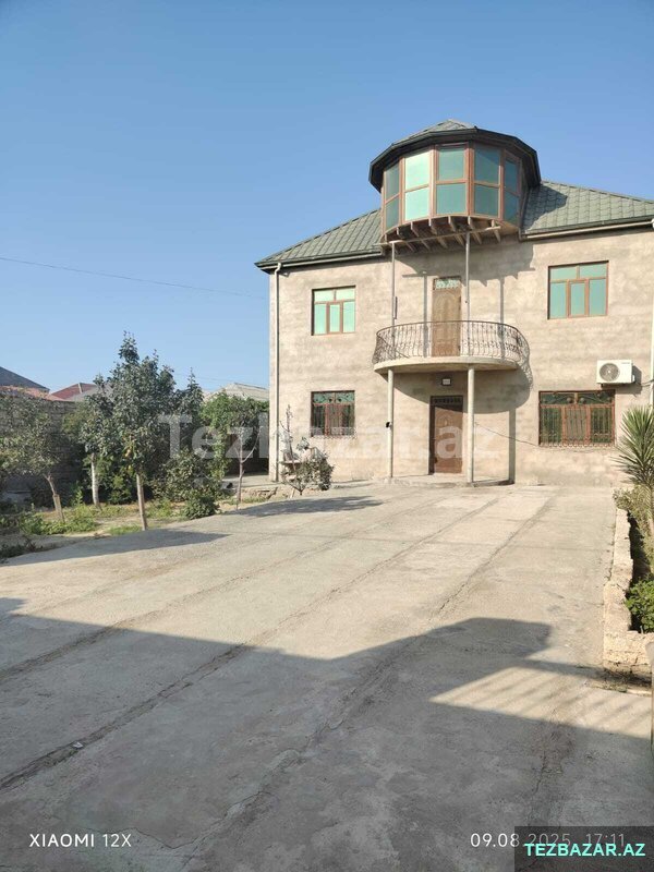Qum Adasında Həyət evi Qum Adasında Həyət evi
